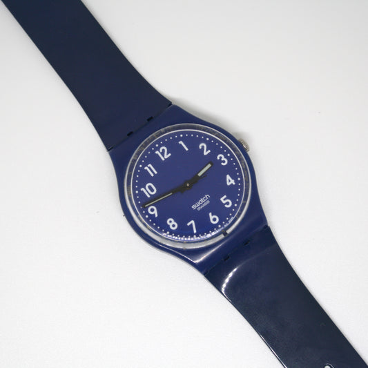 Blue Swatch watch on a white background